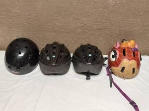 lot 42 image: 4 BIKING HELMETS
