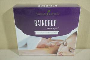 lot 166 image: Young Living Essential Oils Raindrop Pack -7 Oils, 2 Oil Blends, 2 Massage Oils & 2 Pumps