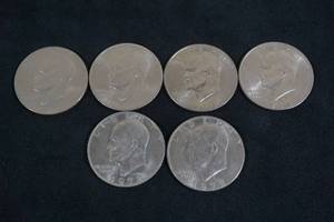 lot 219 image: 6 Eisenhower Dollar Coins
