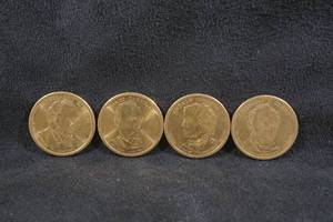 lot 228 image: 4 US Presidential Dollar Coins - Hayes, Garfield, Johnson, Grant