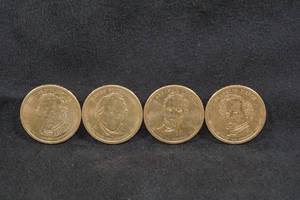 lot 229 image: 4 US Presidential Dollar Coins - Fillmore, Buchanan, Lincoln, Pierce