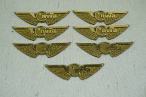 lot 231 image: 7 Northwest Airlines US Pilot Plastic Wings Badge