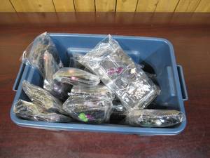 Plastic Tub Full of Earrings