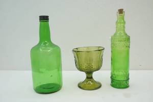 lot 306 image: Vintage green glass bottles