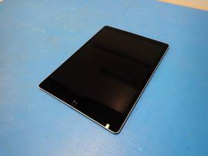 lot 26 image: Apple&nbspA1671 iPad Pro 2nd Gen  512GB of storage  Carrier status unlocked &nbspWhite spot near top left corner, light scratches and chips on screen, unit has slight bend in bottom half  includes charging cable