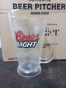 lot 31 image: 12 Coors Light Plastic Pitchers
