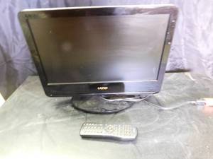 lot 45 image: Small Visio TV with remote