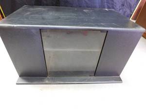 lot 48 image: TV stand w plexi glass door and fromt amd side shelves