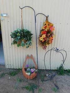 lot 54 image: Double shephards hook. plant stand, planter and artificial floral