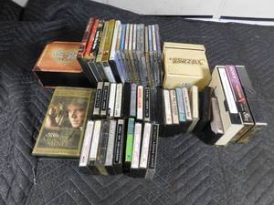 lot 76 image: Box of CDs and DVDs and cassettes