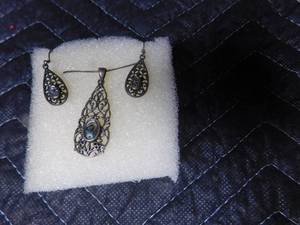 lot 106 image: Sterling Silver earrings and necklace set