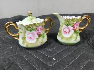 lot 125 image: 2 Sugar and creamer sets