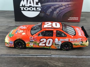 lot 266 image: 2002 Mac Tools Nascar Tony Stewart #20 Grand Prix Home Depot  Its a great Pumpkin 124 scale die cast stock car