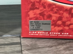lot 285 image: 2000 Action Racing Collectibles Club of America 1990 Pontiac Jeff Gordon #67  Outback Steakhouse 124 scale die cast coin bank stock car