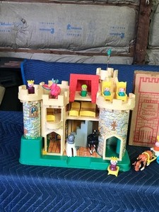 lot 322 image: Vintage Fisher Price castle with accessories
