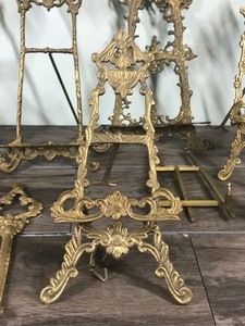 lot 382 image: Vintage brass picture or plate holders