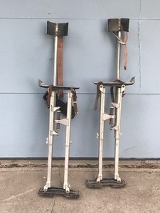 lot 391 image: Drywall painters walking stilts
