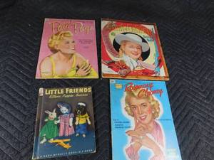 lot 174 image: 1950s paper dolls and hard cover childrens book