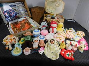 lot 182 image: Sewing basket of sewing supplies, basket, box of material, crocheted items and more