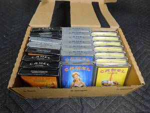 lot 206 image: Display of Camel tins