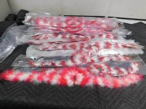 lot 213 image: Red feathered hat bands and pink feathered hat bands