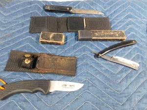 lot 215 image: rocky Mountain Elk Foundation knife and sheath, straight razor and case