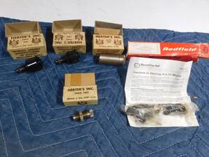lot 237 image: 30-30 Winchester 94 scope mount base, 44 Mag shell holder, 12 gauge 8 pt. crimp starter, 20 gauge starter