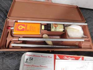 lot 243 image: 3 shotgun and 1 rifle cleaning kits, sharpening stick and hand trap
