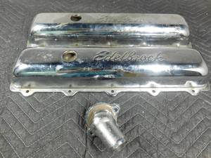 lot 402 image: Valve covers and thermostat.