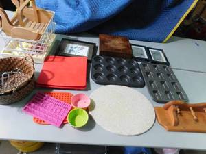lot 458 image: Brownie and muffin pan, silicone molds, granite cutting board and more