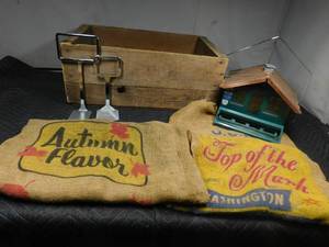 lot 478 image: Wood crate of 2 gunny sacks, bird feeder and 2 sign holders