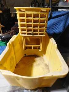 lot 495 image: Janitorial mop bucket, carry-on case, lawn hose w reel, and door foam insulating strip