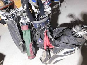 lot 497 image: 4 Golf bags full of clubs