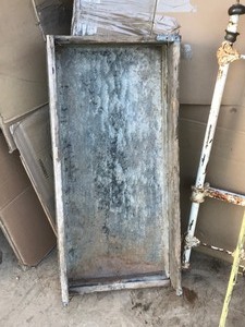 lot 551 image: Vintage headboard, cement mixing trough and old metal rack