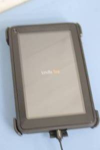 lot 9 image: Amazon Kindle Fire Gen 1 Computer  Streaming Tablet in Protective Otter Case - Excellent Condition