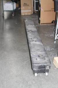 lot 114 image: Drape Kings LONG (Approximately 10) Hard-Sided Pipe  Screen  Drapery Case with Wheels