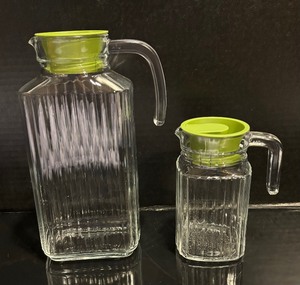 lot 136 image: Two Vintage Juice Pitchers by Arc (France)