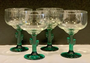 lot 88 image: Set of Four Libbey Saguaro Emerald Green Cactus Stemmed Cocktail Glasses