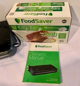 lot 212 image: Food Saver The Vacuum Sealing System - Instruction Manual and Food Storage Bags