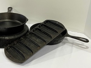 lot 257 image: Three Pieces of Lodge Cast Iron Cookware