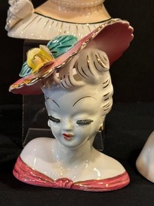 lot 293 image: Four Vintage Lady Head Vases