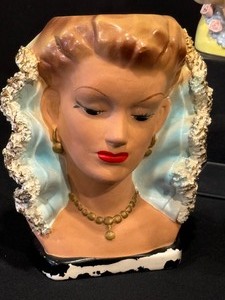 lot 292 image: Three Vintage Lady Head Vases
