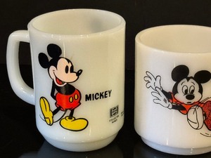 lot 449 image: Two Vintage Mickey Mouse Milk Glass Mugs