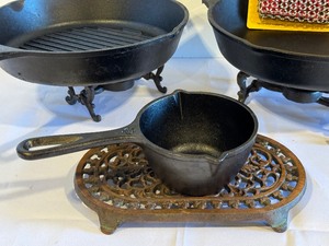 lot 538 image: Two Lodge Cast Iron Pans and More