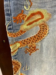 lot 536 image: Vintage Vanilla Sky Jeans with Embroidered Dragon Design