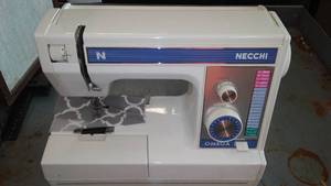 lot 636 image: Necchi Omega Sewing Machine.