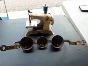 lot 36 image: Tin Toy Sewing Machine & Vintage Door Bells On A Bracket