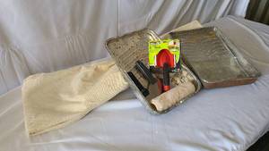 Painting supplies and bundled tarp ...