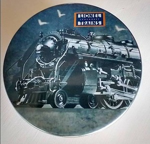 lot 61 image: Lionel Trains Pocket Watch in Tin