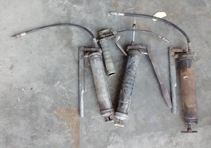 lot 63 image: (4) Grease Guns